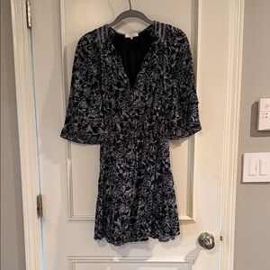 Parker Black Floral V-Neck Mini Dress with White Print.  Size S
